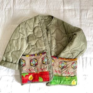 Upcycled military liner with quilted patch pockets